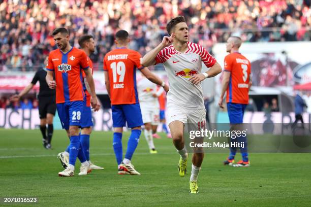 Christoph Baumgartner of RB Leipzig celebrates scoring his team's second goal during the Bundesliga match between RB Leipzig and SV Darmstadt 98 at...