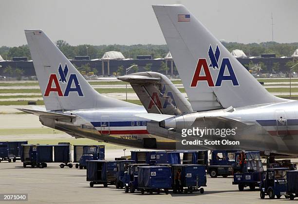American Airlines jets sit on the tarmac at O'Hare Airport June 10, 2003 in Chicago, Illinois. Moody's, the credit rating service, said June 9 that...