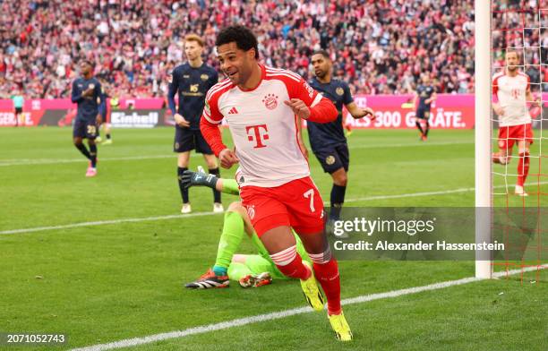 Serge Gnabry of Bayern Munich celebrates scoring his team's sixth goal during the Bundesliga match between FC Bayern München and 1. FSV Mainz 05 at...