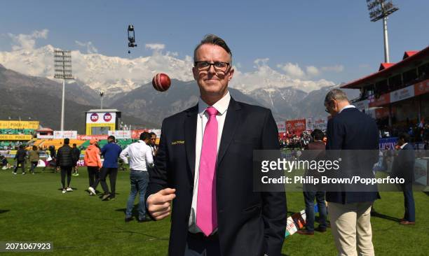 Graeme Swann working for TNT Sports tosses a ball after the 5th Test Match between India and England at Himachal Pradesh Cricket Association Stadium...