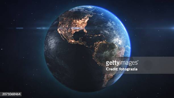 planet earth seen from space. view of south and north america with city lights at night - royal blue stock pictures, royalty-free photos & images