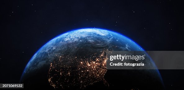 Planet Earth Seen From Space. View of North America with City Lights at Night Planet Earth Seen From Space. View of North America with City Lights at Night