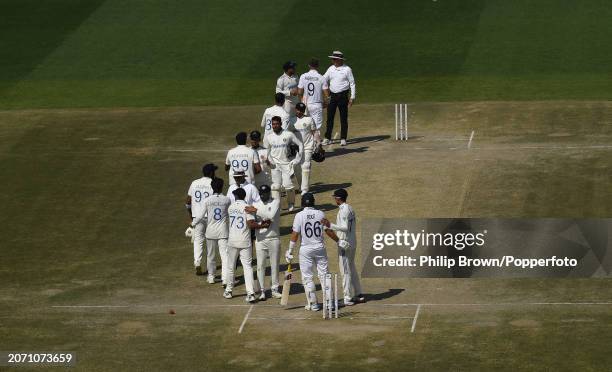 Joe Root and James Anderson shake hands with India players after the 5th Test Match between India and England at Himachal Pradesh Cricket Association...