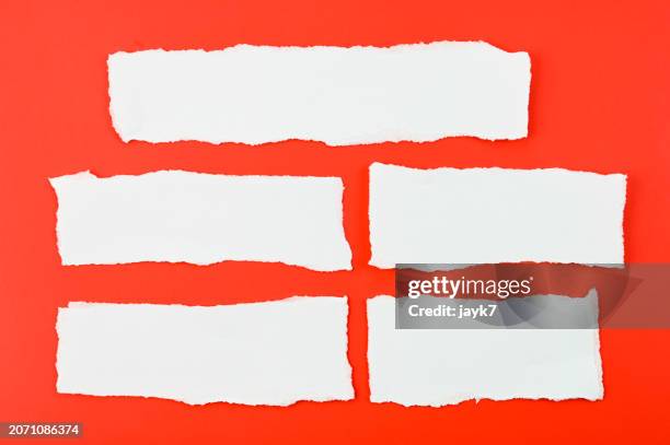 torn papers - papel cortado fotografías e imágenes de stock