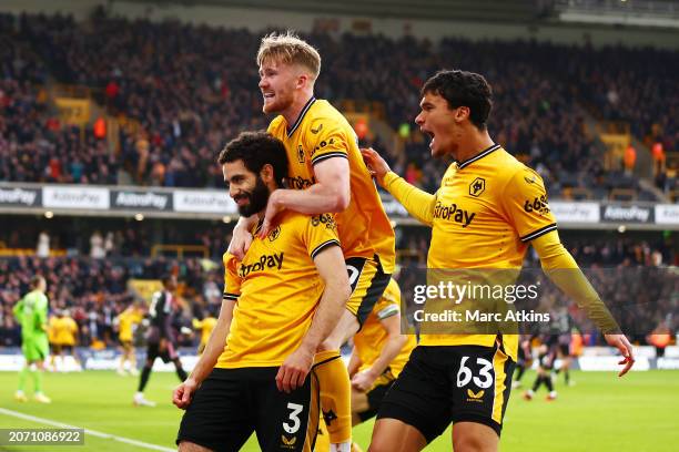 Rayan Ait-Nouri of Wolverhampton Wanderers celebrates scoring his team's first goal with teammates Tommy Doyle and Nathan Fraser during the Premier...