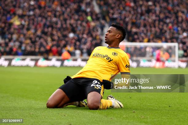 Nelson Semedo of Wolverhampton Wanderers celebrates his team’s second goal, an own-goal scored by Tom Cairney of Fulham during the Premier League...