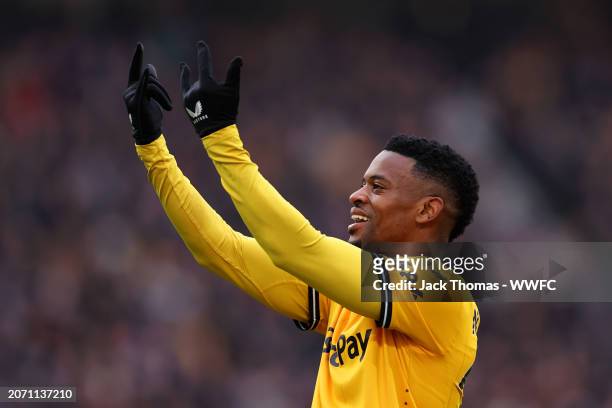 Nelson Semedo of Wolverhampton Wanderers celebrates his team’s second goal, an own-goal scored by Tom Cairney of Fulham during the Premier League...