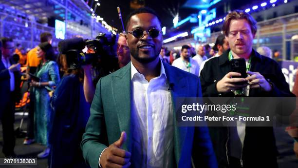 Patrice Evra walks on the grid during the F1 Grand Prix of Saudi Arabia at Jeddah Corniche Circuit on March 09, 2024 in Jeddah, Saudi Arabia.