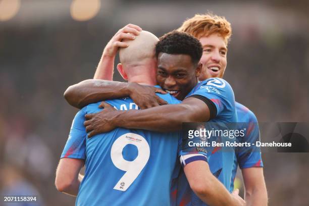 Paddy Madden of Stockport County celebrates his goal to make it 1-0 with Isaac Olaofe of Stockport County during the Sky Bet League Two match between...