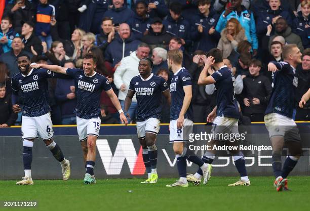 Millwall players celebrate the late winner scored by Japhet Tanganga during the Sky Bet Championship match between Millwall and Birmingham City at...