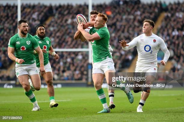 George Furbank of England knocks on leading the try scored by Ollie Lawrence to be disallowed during the Guinness Six Nations 2024 match between...