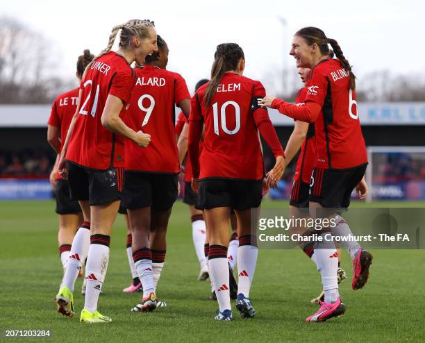 Millie Turner of Manchester United celebrates scoring his team's first goal with teammates during the Adobe Women's FA Cup Quarter Final match...