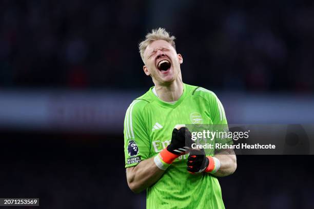 Aaron Ramsdale of Arsenal celebrates after teammate Declan Rice scores the team's first goal during the Premier League match between Arsenal FC and...