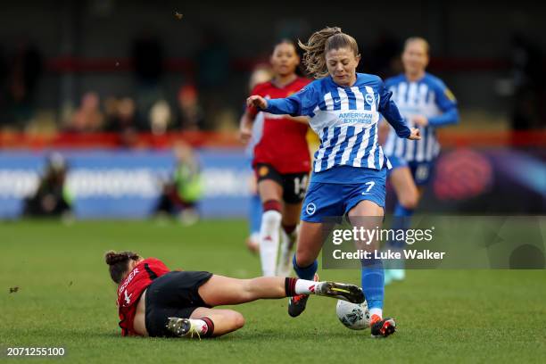 Veatriki Sarri of Brighton & Hove Albion is challenged by Maya Le Tissier of Manchester United during the Adobe Women's FA Cup Quarter Final match...