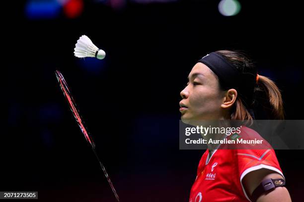 Chen Qinq Chen of China stares at the shuttle during the Women's double semi final match against Mayu Matsumoto and Wakana Nagahara of Japan at the...