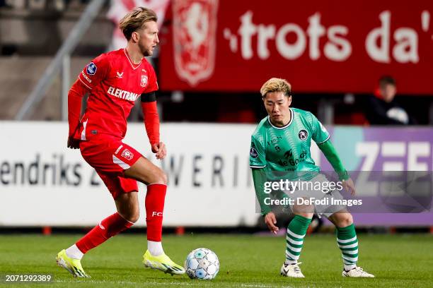 Michel Vlap of FC Twente and Shunsuke Mito of Sparta Rotterdam battle for the ball during the Dutch Eredivisie match between FC Twente and Sparta...