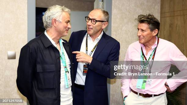 Jose Mourinho, Stefano Domenicali, CEO of the Formula One Group, and Sebastian Coe speak in the Paddock prior to the F1 Grand Prix of Saudi Arabia at...