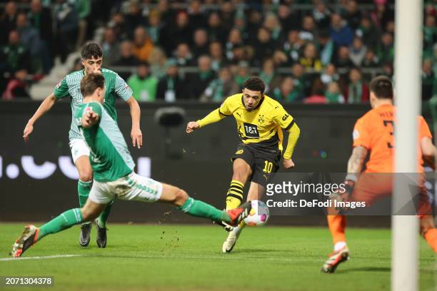 Jadon Sancho of Borussia Dortmund scores the goal with this shot to make it 0:2 during the Bundesliga match between SV Werder Bremen and Borussia...
