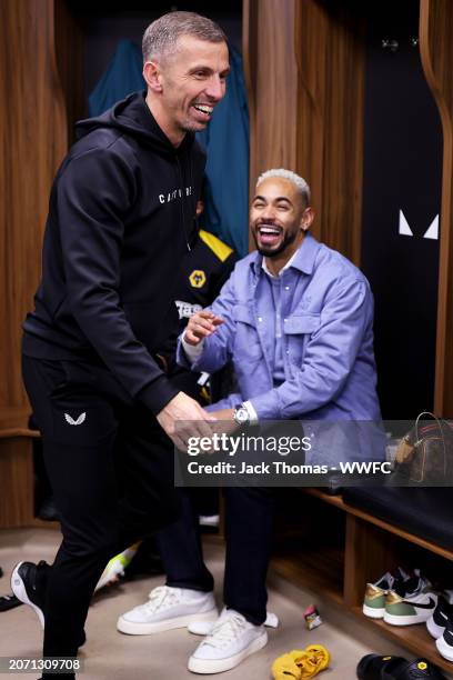 Gary O'Neil, head coach of Wolverhampton Wanderers and Matheus Cunha of Wolverhampton Wanderers celebrate in the Wolves dressing room following...