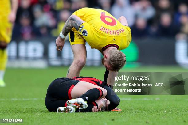 Oliver McBurnie of Sheffield United stands over Adam Smith of Bournemouth during the Premier League match between AFC Bournemouth and Sheffield...