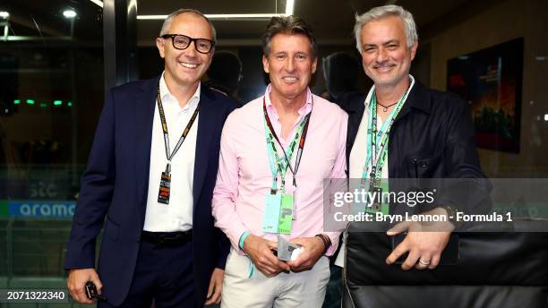 Stefano Domenicali, CEO of the Formula One Group, Sebastian Coe and Jose Mourinho pose for a photo in the Paddock prior to the F1 Grand Prix of Saudi...