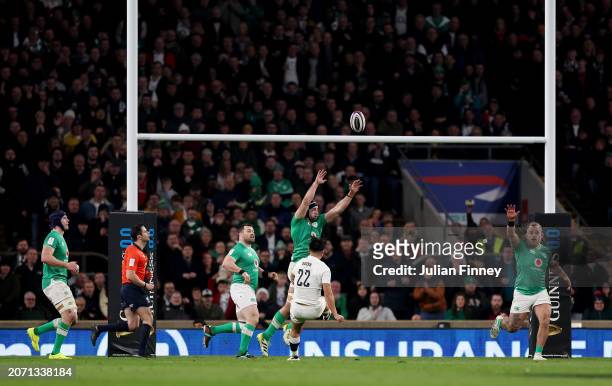 Marcus Smith of England scores the winning drop goal during the Guinness Six Nations 2024 match between England and Ireland at Twickenham Stadium on...