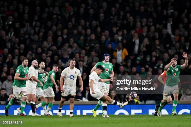 Marcus Smith of England scores the winning drop goal during the Guinness Six Nations 2024 match between England and Ireland at Twickenham Stadium on...