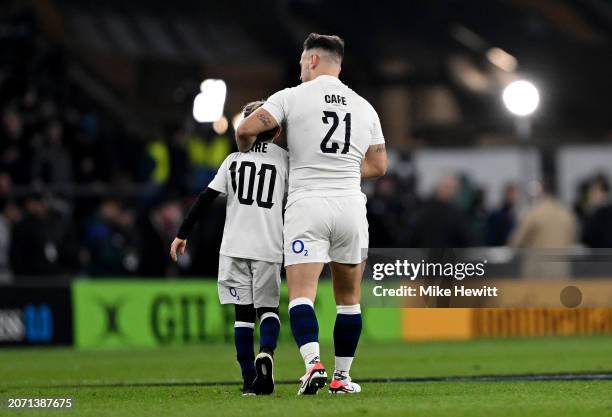 Danny Care of England celebrates with his child following his 100th Cap appearance and the team's victory during the Guinness Six Nations 2024 match...