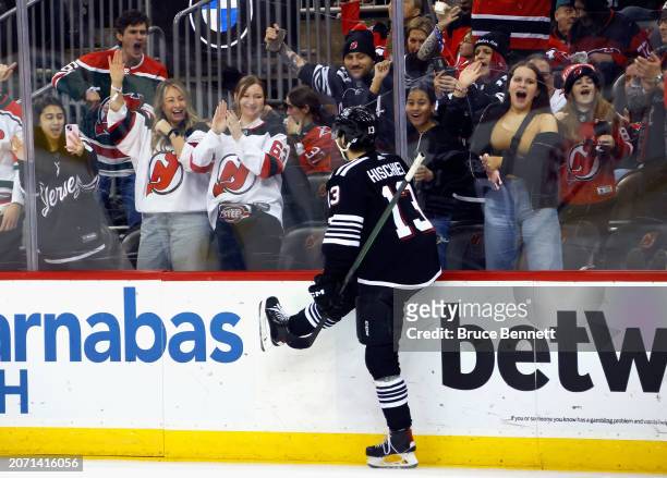 Nico Hischier of the New Jersey Devils celebrates his goal against the Carolina Hurricanes at 15:27 of the second period at Prudential Center on...