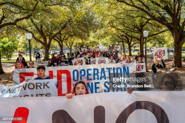 People march in protest against Texas Senate Bill 4 during a rally hosted by the ACLU of Texas at the State Capitol on March 09, 2024 in Austin,...