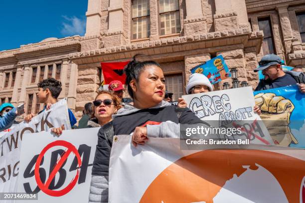 People protest against Texas Senate Bill 4 during a rally hosted by the ACLU of Texas at the State Capitol on March 09, 2024 in Austin, Texas. People...