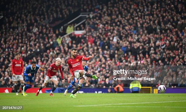 Bruno Fernandes of Manchester United scores a penalty to make it 1-0 during the Premier League match between Manchester United and Everton FC at Old...