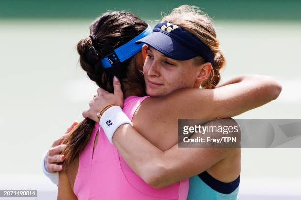Dayana Yastremska of Russia is consoled by Emma Raducanu of Great Britain after retiring with a stomach injury in the second round of the BNP Paribas...