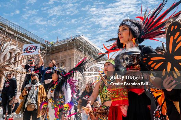 Members of the Ollinyolloti Danza Mexica group participate in a protest against Texas Senate Bill 4 during a rally hosted by the ACLU of Texas at the...