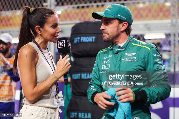 Fernando Alonso of Spain and Aston Martin speaks with Melissa Jimenez of DAZN on the grid prior to the F1 Grand Prix of Saudi Arabia at Jeddah...