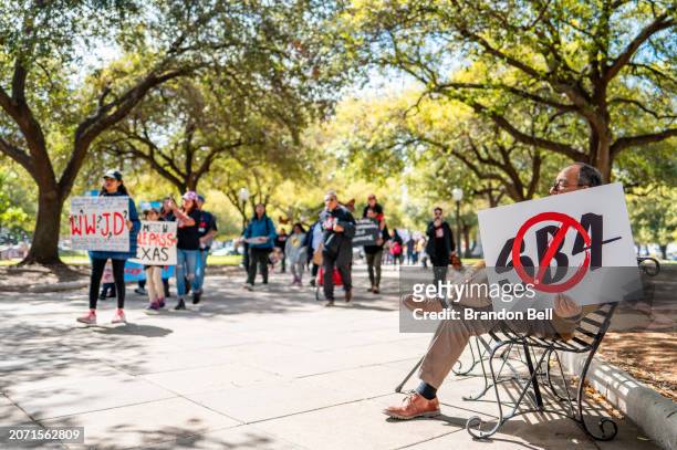 People march in protest against Texas Senate Bill 4 during a rally hosted by the ACLU of Texas at the State Capitol on March 09, 2024 in Austin,...