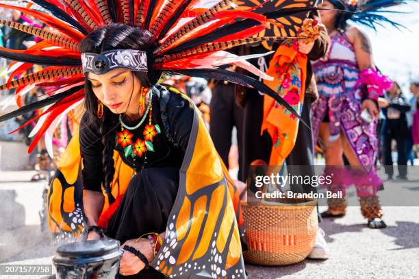 Members of the Ollinyolloti Danza Mexica group participate in a protest against Texas Senate Bill 4 during a rally hosted by the ACLU of Texas at the...