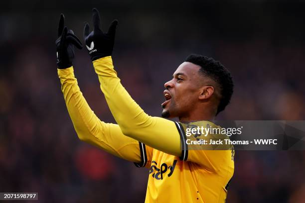 Nelson Semedo of Wolverhampton Wanderers celebrates after scoring his team's second goal during the Premier League match between Wolverhampton...