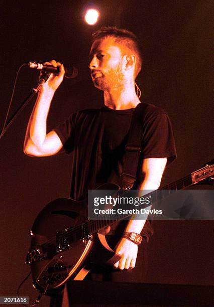 Thom Yorke, lead singer with British indie rock group "Radiohead", performs live on stage at the Victoria Park gig in London on September 23, 2000....