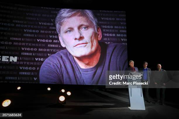 Actor and director Viggo Mortensen receives the Tribute award from Director Gaspar Noe and journalist Philippe Rouyer during the Closing Ceremony...