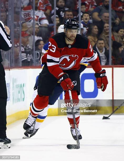 Kurtis MacDermid of the New Jersey Devils skates against the St. Louis Blues at Prudential Center on March 07, 2024 in Newark, New Jersey.