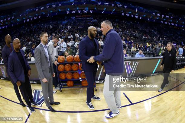 Head coach Kyle Neptune of the Villanova Wildcats and head coach Greg McDermott of the Creighton Bluejays greet before a game at the Wells Fargo...
