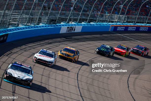 Chandler Smith, driver of the QuickTie Toyota, Cole Custer, driver of the Haas Automation Ford, and Corey Heim, driver of the GearWrench Toyota, race...