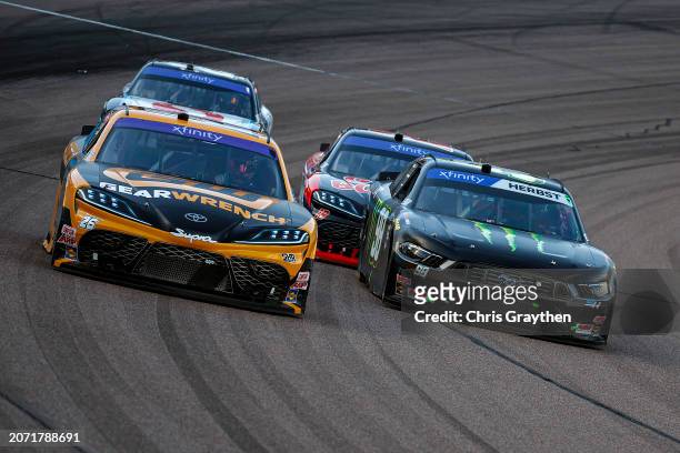 Corey Heim, driver of the GearWrench Toyota, Riley Herbst, driver of the Monster Energy Ford, Aric Almirola, driver of the Go Bowling Toyota, and...