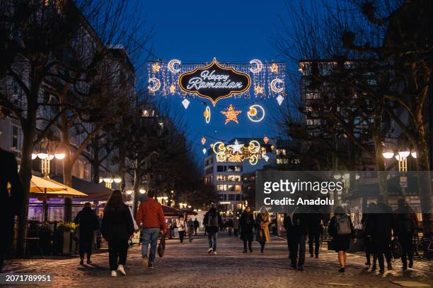 Street is illuminated with half moons, stars and a ''Happy Ramadan'' sign on the occasion of the beginning of the holy month of Ramadan on March 11,...
