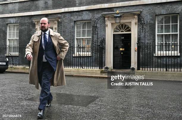 Britain's Minister without Portfolio and Conservative Party Chair Richard Holden leaves after attending a weekly cabinet meeting at 10 Downing Street...