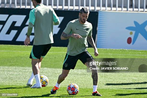Atletico Madrid's Argentinian midfielder Rodrigo De Paul attends a training session on the eve of their UEFA Champions League last 16 second leg...