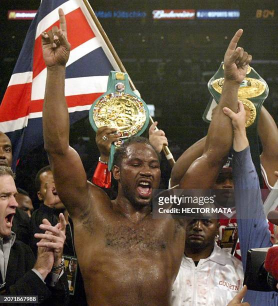 World Heavyweight Champion Lennox Lewis from the UK raises his arms after winning against Vladimir Klitschko from Ukraine at the Staples Center in...