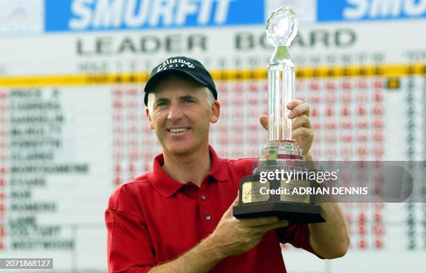 Phillip Price of Wales holds the trophy after winning the European Open at The K Club in Straffan, west of Dublin, Ireland 06 July 2003. Price, who...