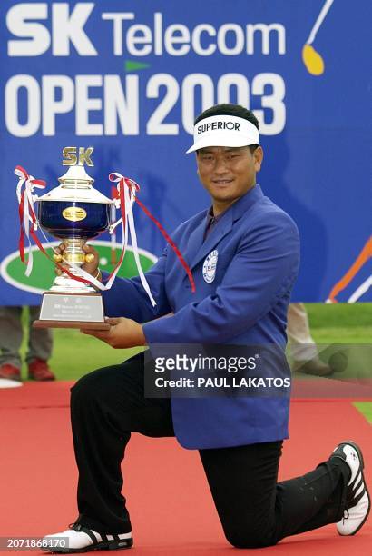Choi Kyung-ju of Korea holds up the SK Telecom Open trophy on 29 June 2003 at the Baekahmvista Country Club, Seoul. Choi won the USD$ 400,000 event...